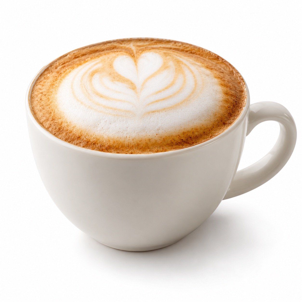A white ceramic cup filled with a frothy cappuccino featuring latte art in the shape of a heart and leaf pattern.