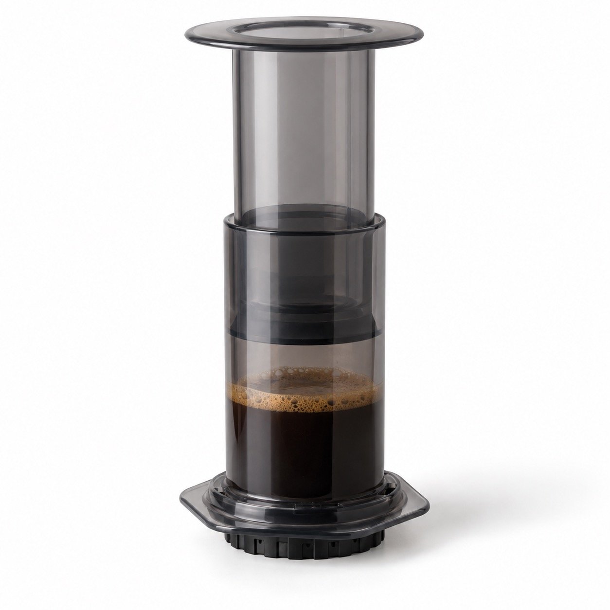 A French press coffee maker with brewed coffee inside.