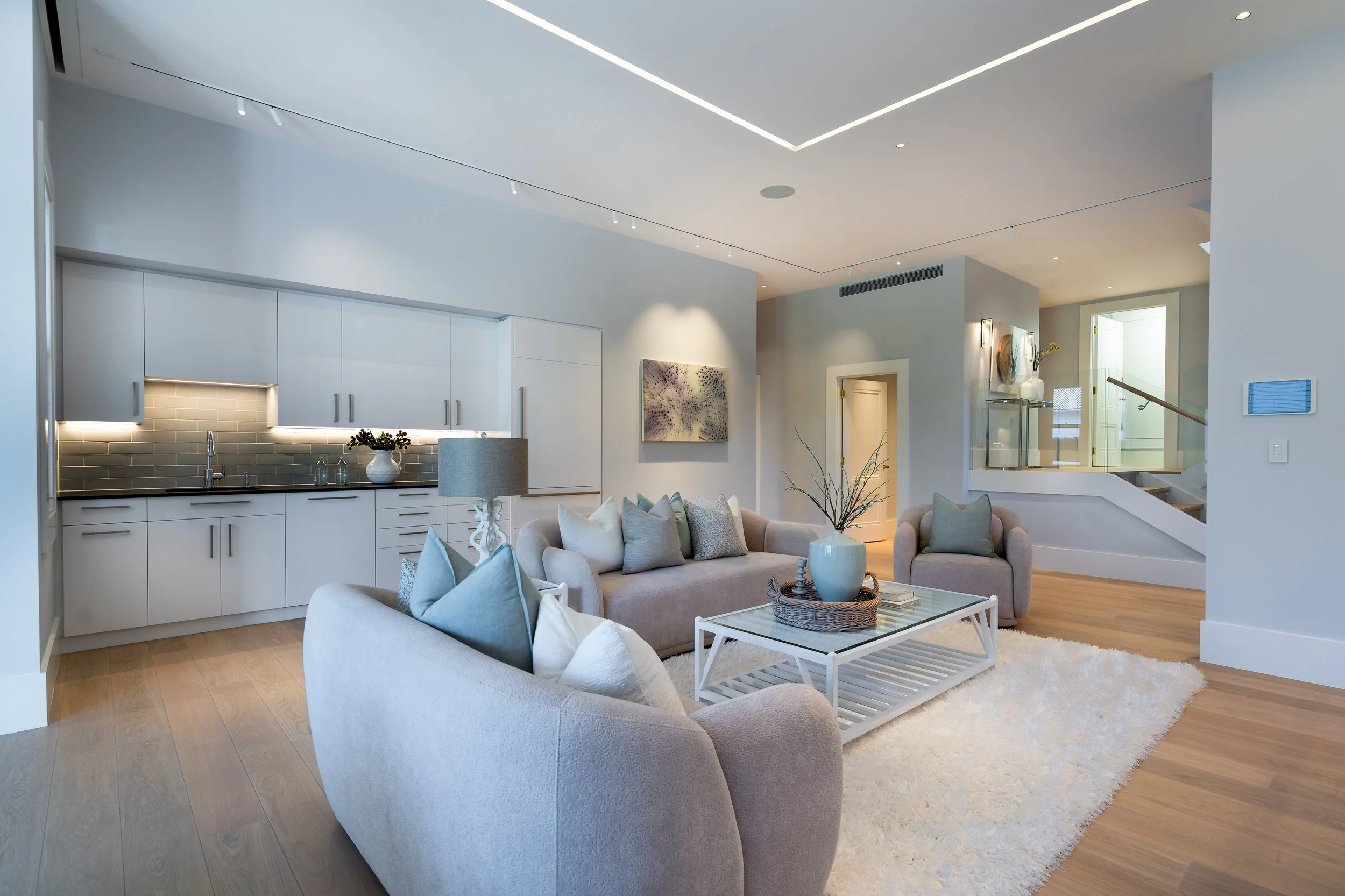 Downstairs lounge with private kitchenette suits entertaining, multi-generational living, and other uses