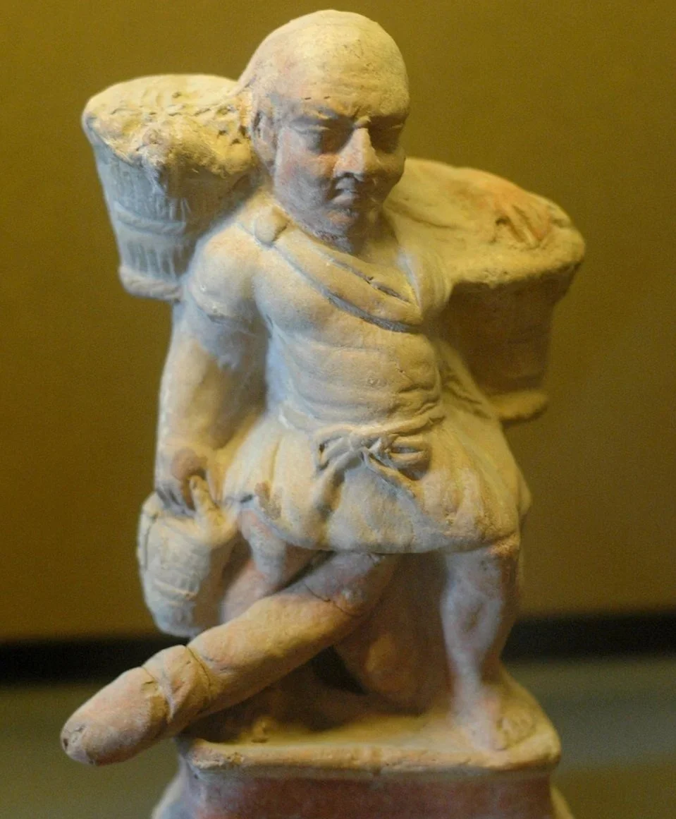 Ithyphallic dwarf slave figurine