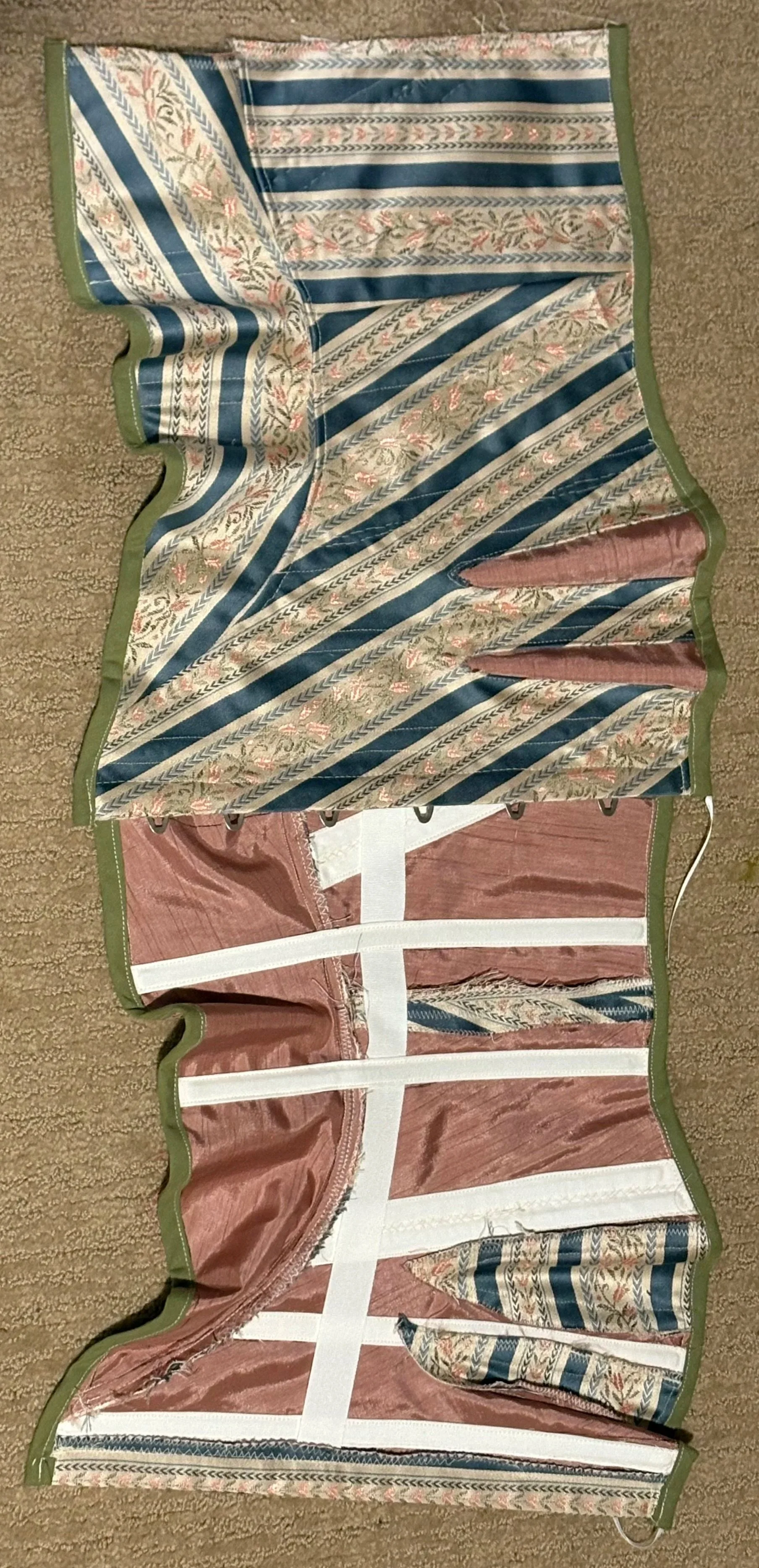 Progress Update 2: The Corset front has been sides have been sewn together and the busk has been put in place. 