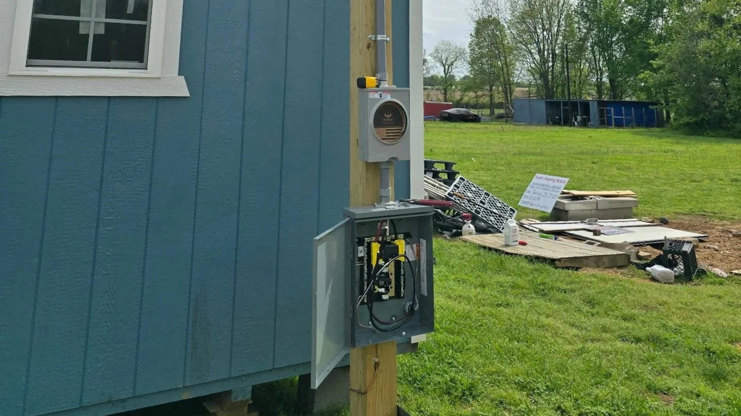 Oranssi technician working on a roof project
