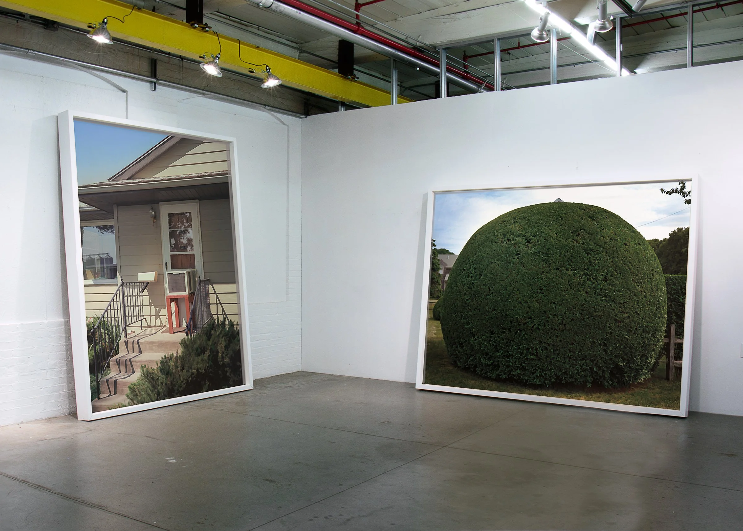 Installation of a large-scale artwork in a gallery setting.