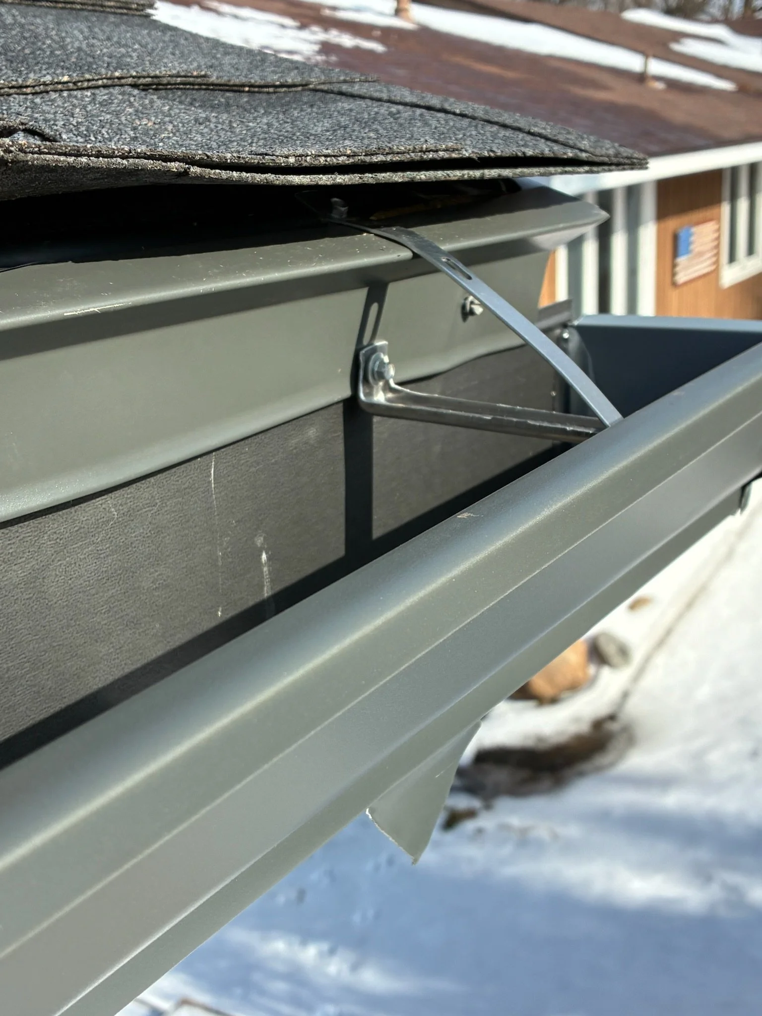 Slanted Facia Gutter Install.jpeg