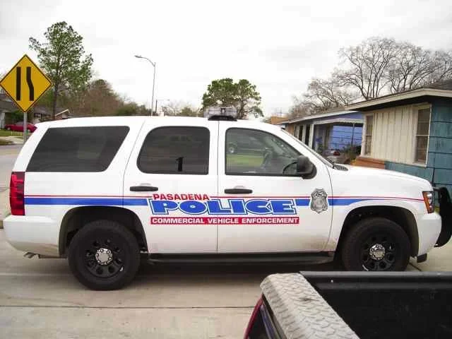 Pasadena police SUV parked on the street in a residential area.
