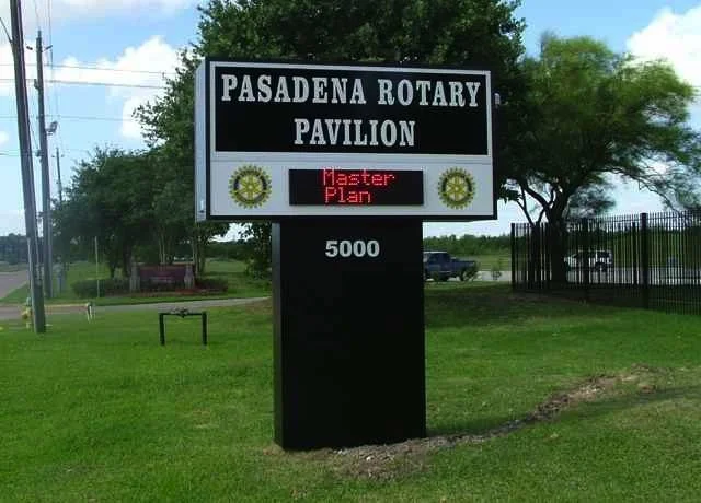 Sign for Pasadena Rotary Pavilion with illuminated message reading 'Master Plan' and the number 5000.