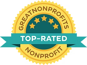 Gold badge with blue ribbon reading 'TOP-RATED' and text indicating 'Great Nonprofits' and 'Nonprofit'
