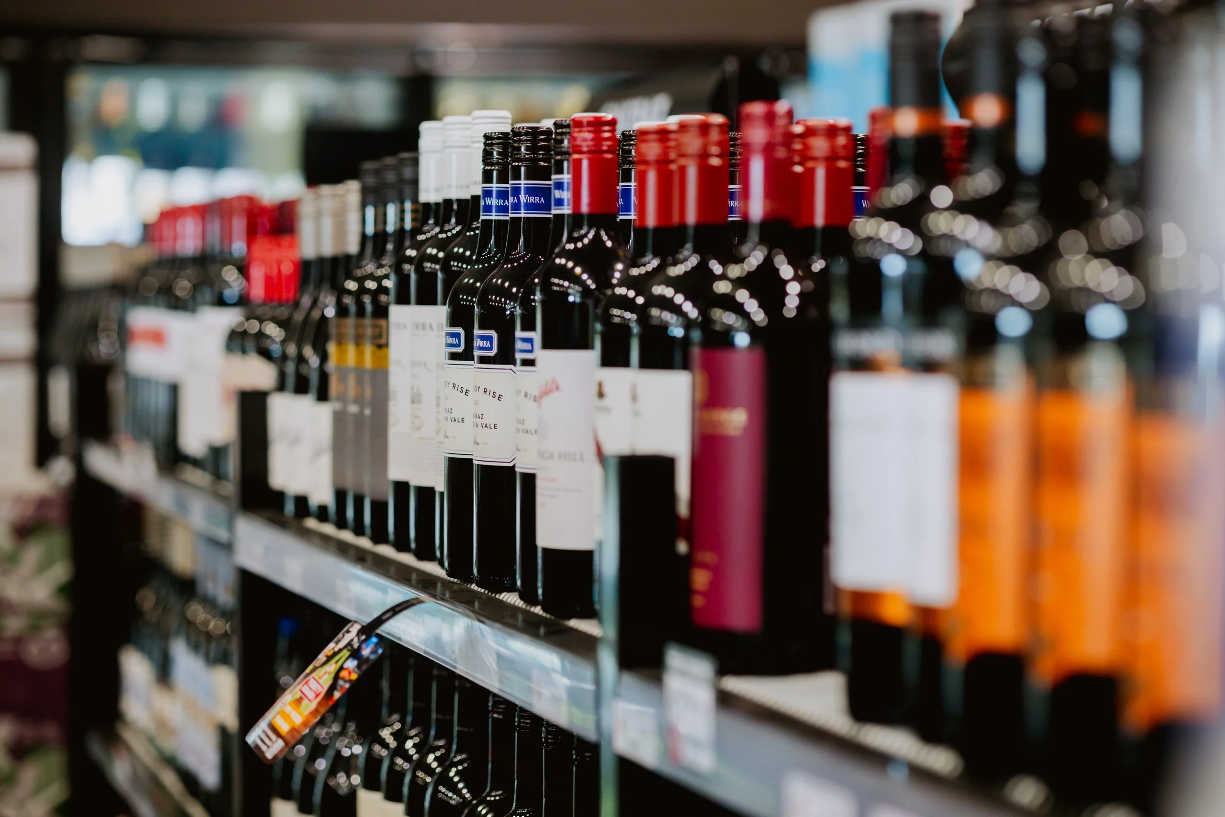 Rows of wine bottles at the Bottle Shop at The Racecourse Hotel Werribee