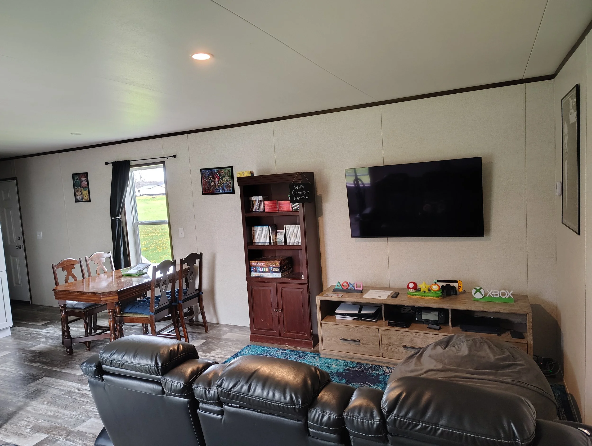 Modern gaming area and the dining room. 