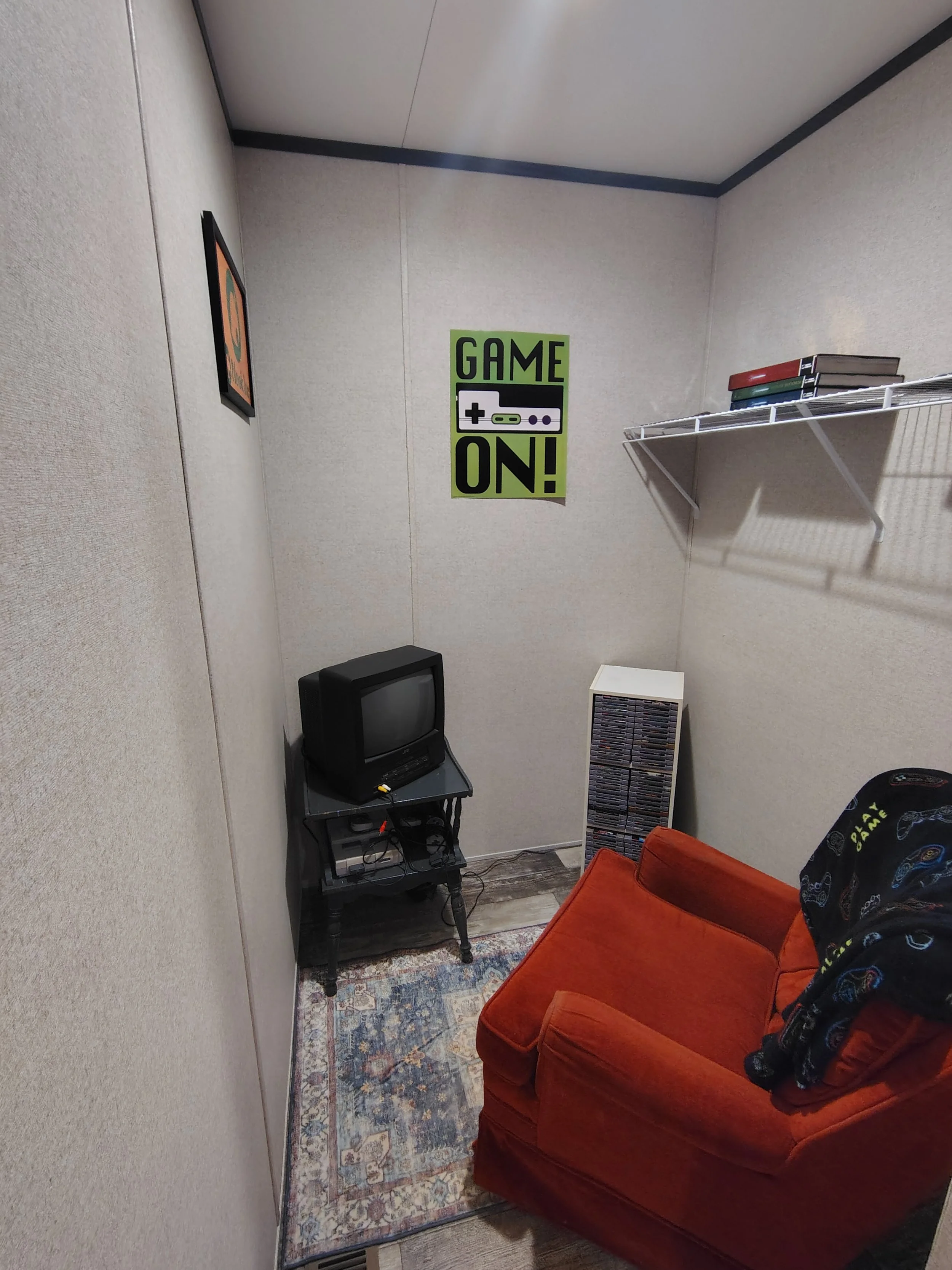 The Secret Nook! A cozy quiet getaway with a retro cozy chair and a Super Nintendo. 