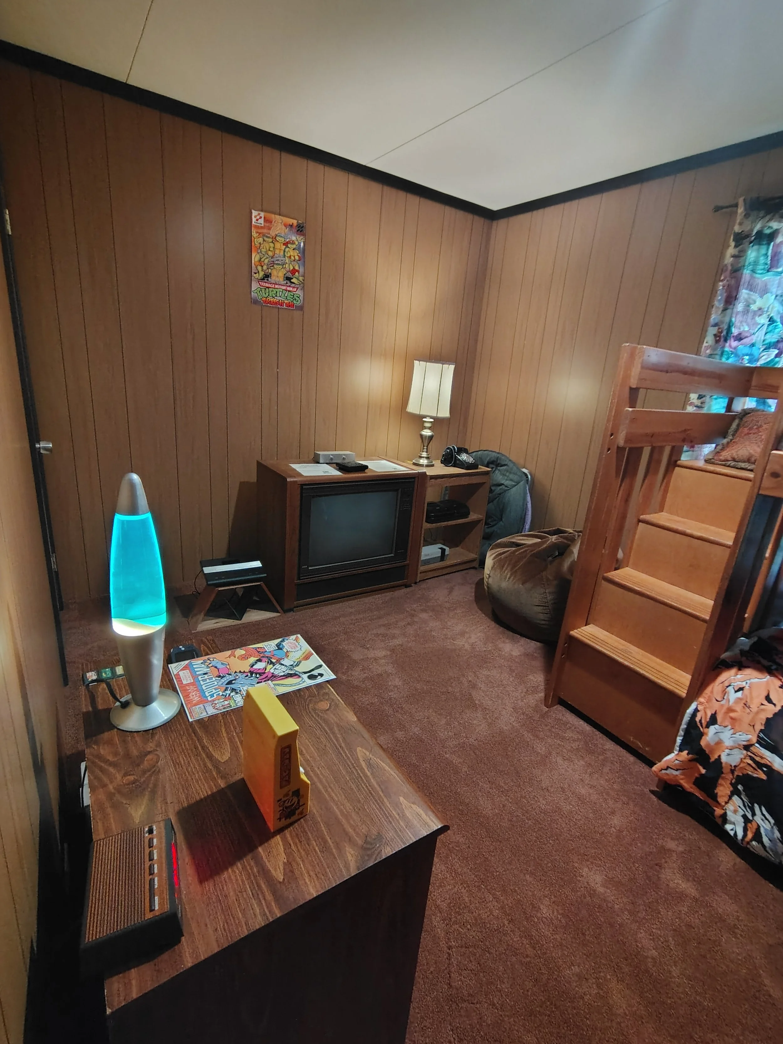 The Retro Room! Like walking back into Grandma's basement, wood panel walls, plush orangey carpet and chill vibes. 