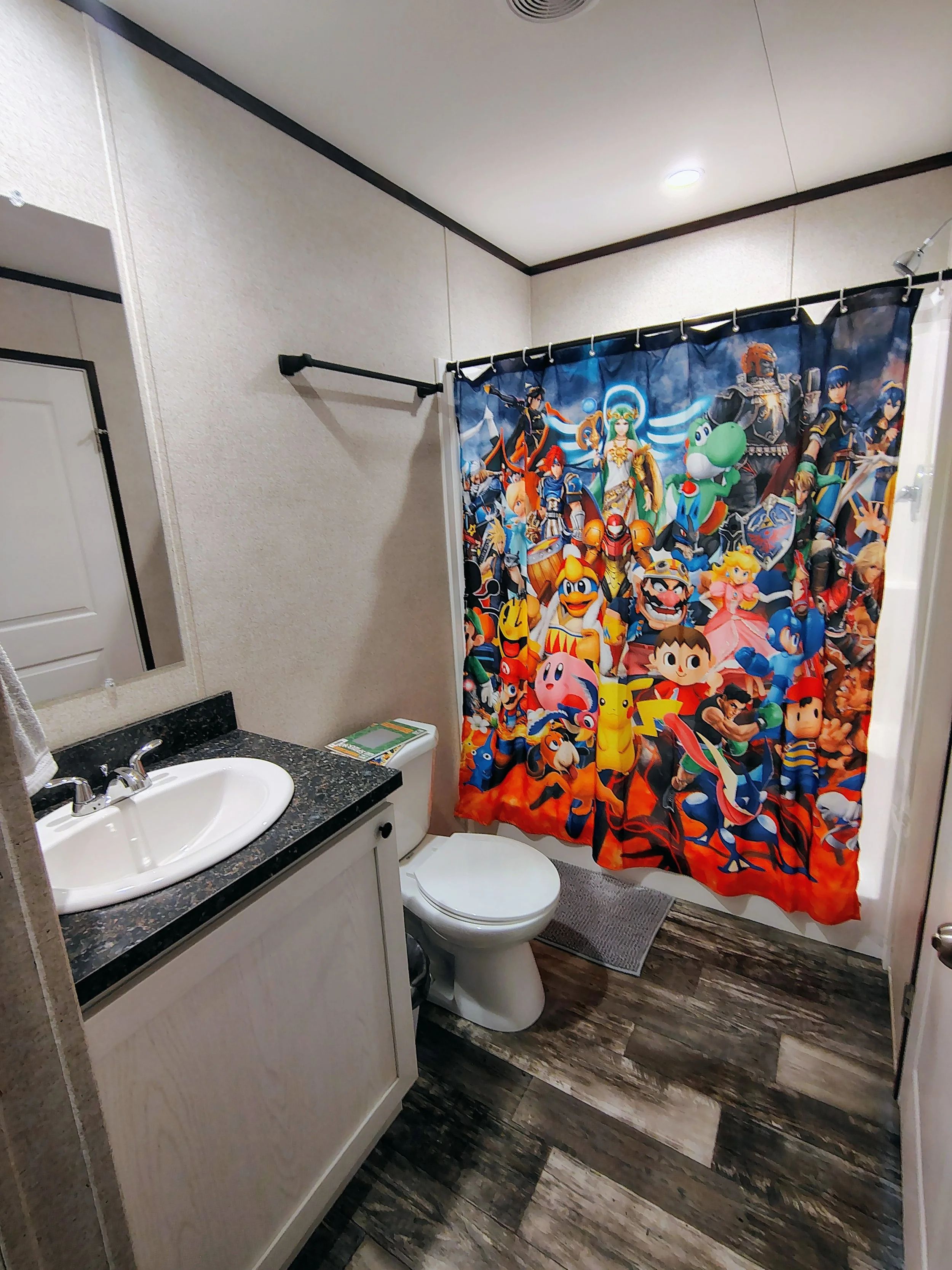 Connected to the Throwback room, a full-size bathroom with shower.