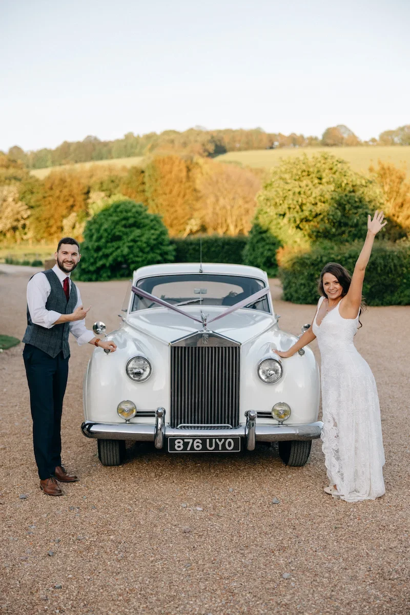 Vintage wedding car photographed at a real Sussex wedding