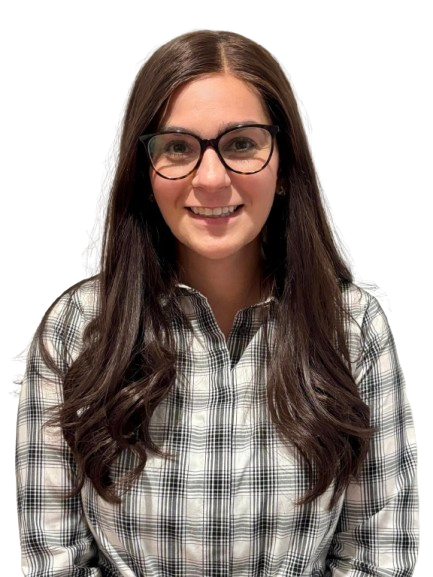 A woman with long brown hair, glasses, and a plaid shirt smiling at the camera.