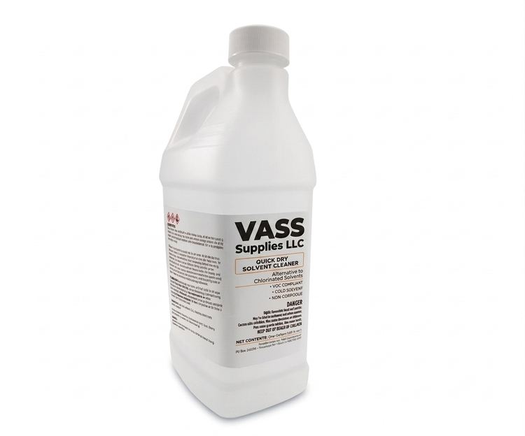 A white plastic bottle of VASS Supplies LLC quick dry solvent cleaner with a label showing caution and product information.