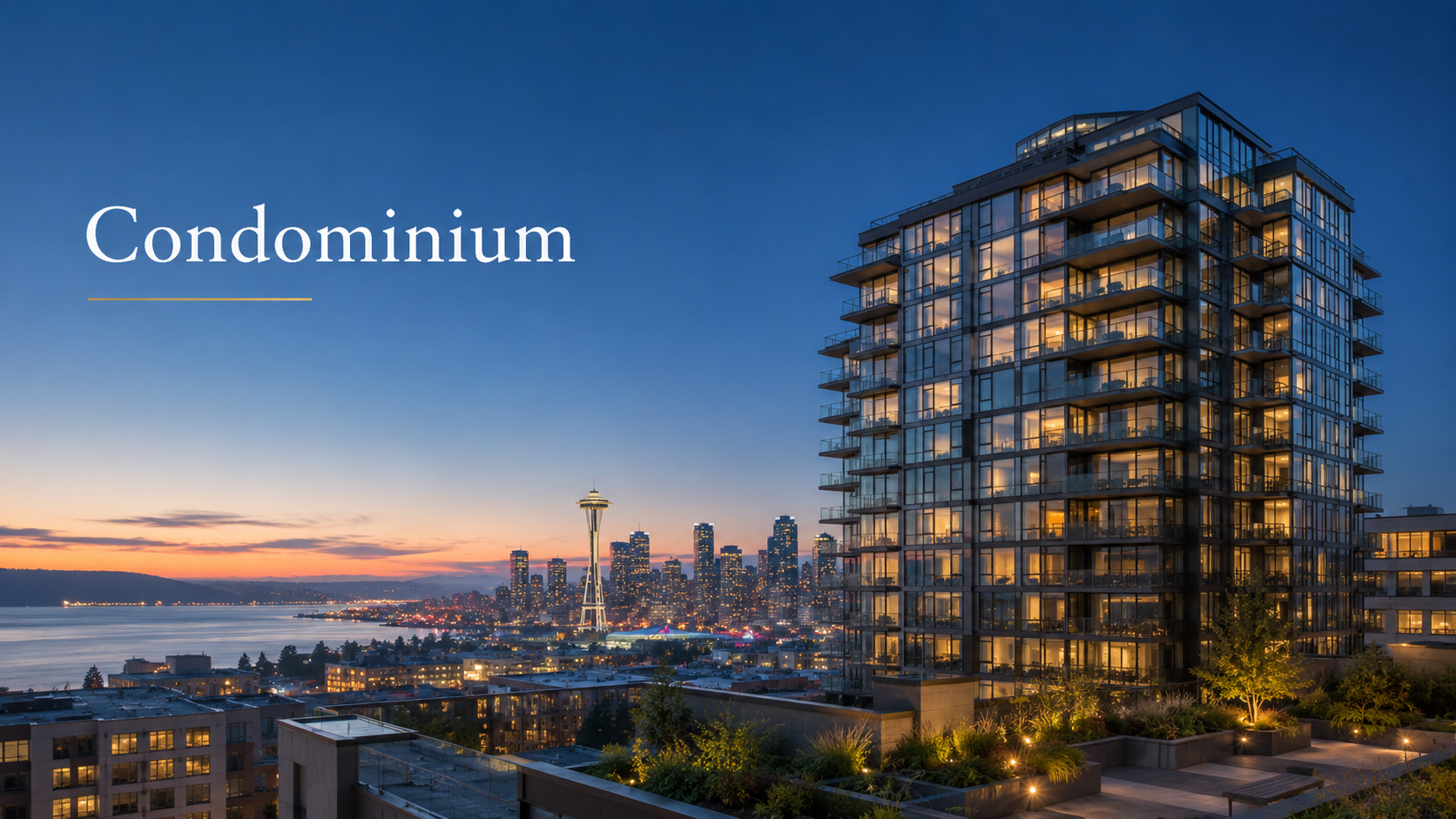 Modern high-rise condominium building overlooking the Seattle skyline and waterfront during dusk with a lit tower in the background.