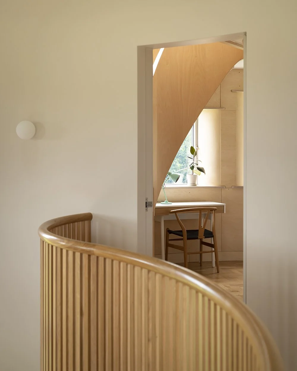 Bumpers Oast, Lucy Moroney Project Architect, Landing to bedroom, project interior stair view toward a compact study with timber joinery.