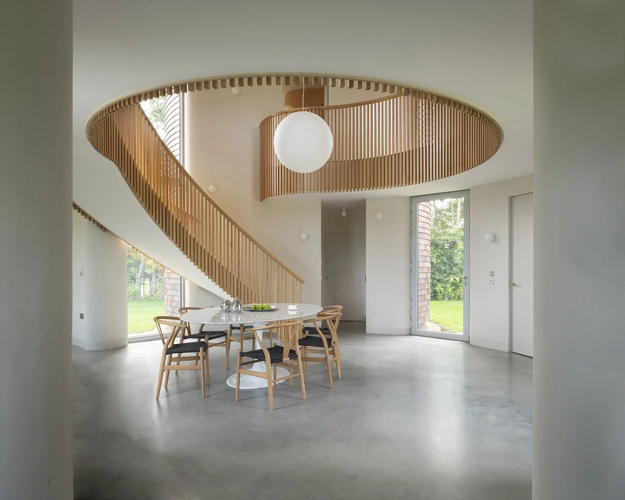 Bumpers Oast, Lucy Moroney Project Architect, Atrium, project interior dining space with sculptural timber stair and circular pendant light.