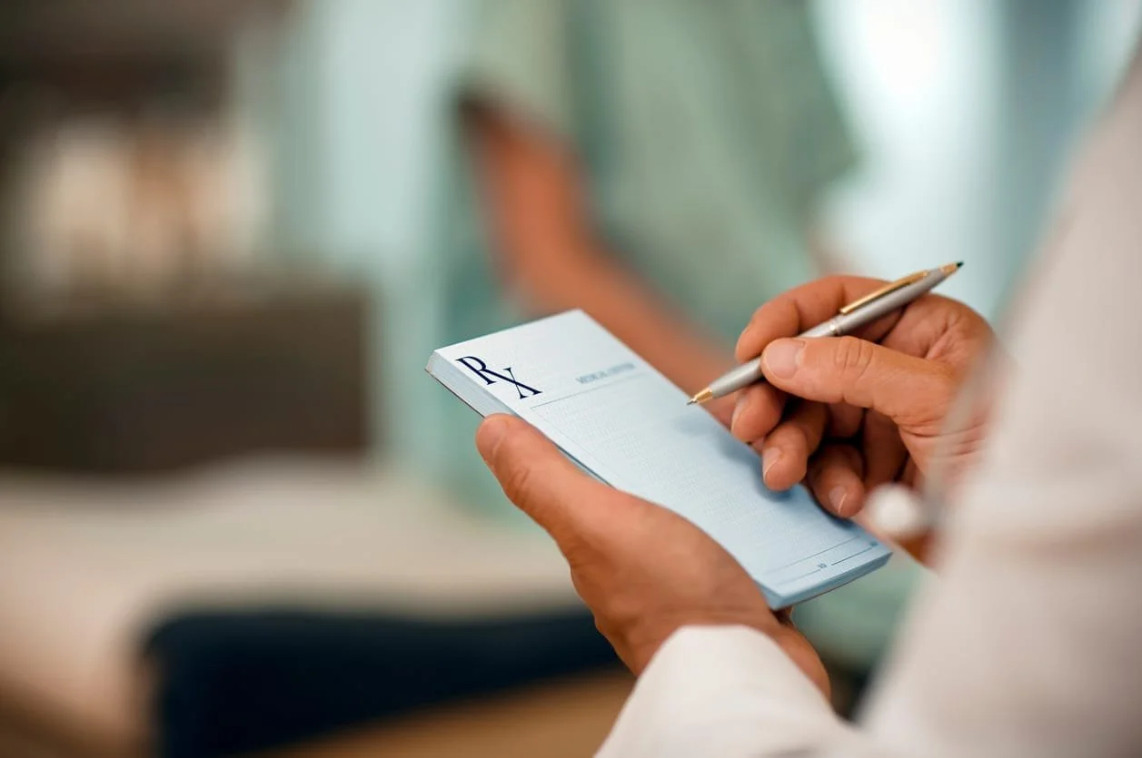 Physician reviewing durable medical equipment referral documentation with a patient.