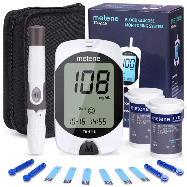 Blood glucose monitoring system with a digital meter displaying a reading of 108 mg/dL, lancets, test strips, and related accessories.