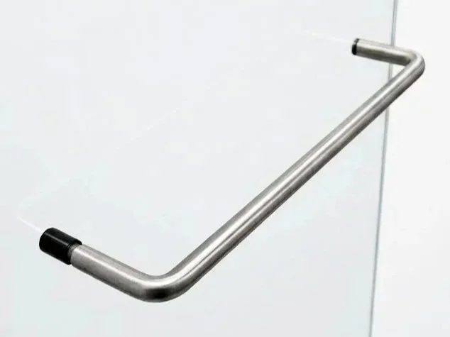 A metal grab bar mounted on a white wall, typically used in bathrooms for support.