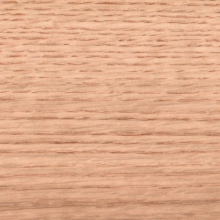 Close-up of a light-colored wooden surface with visible grain patterns.