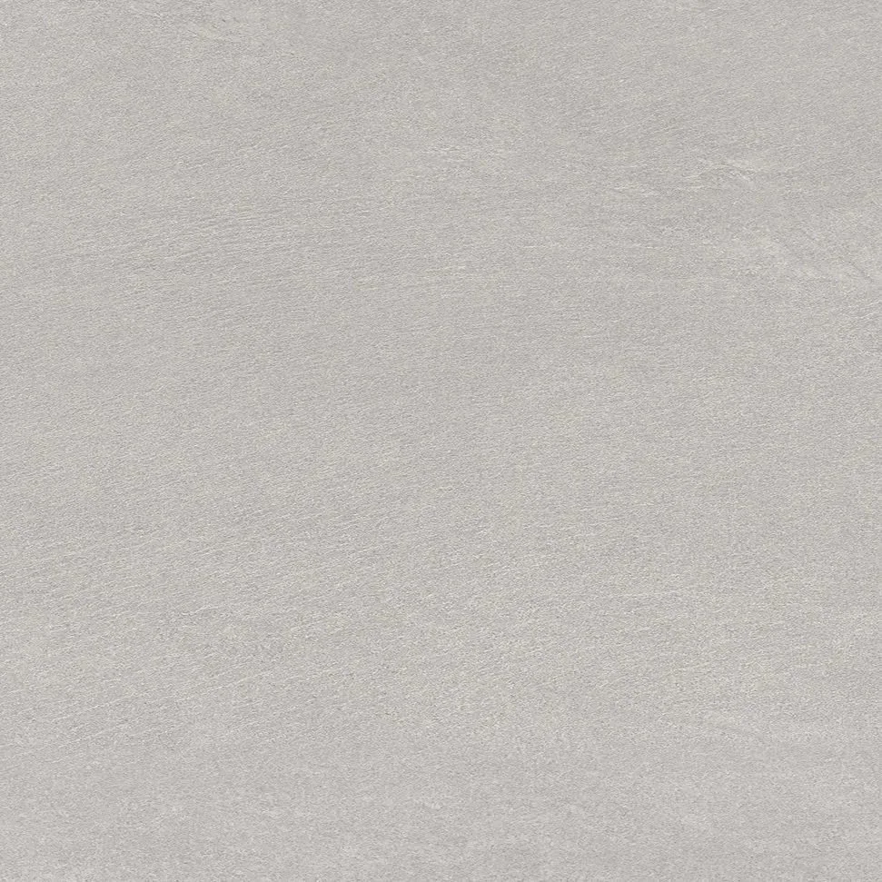 Close-up of a metallic silver surface with a brushed texture.