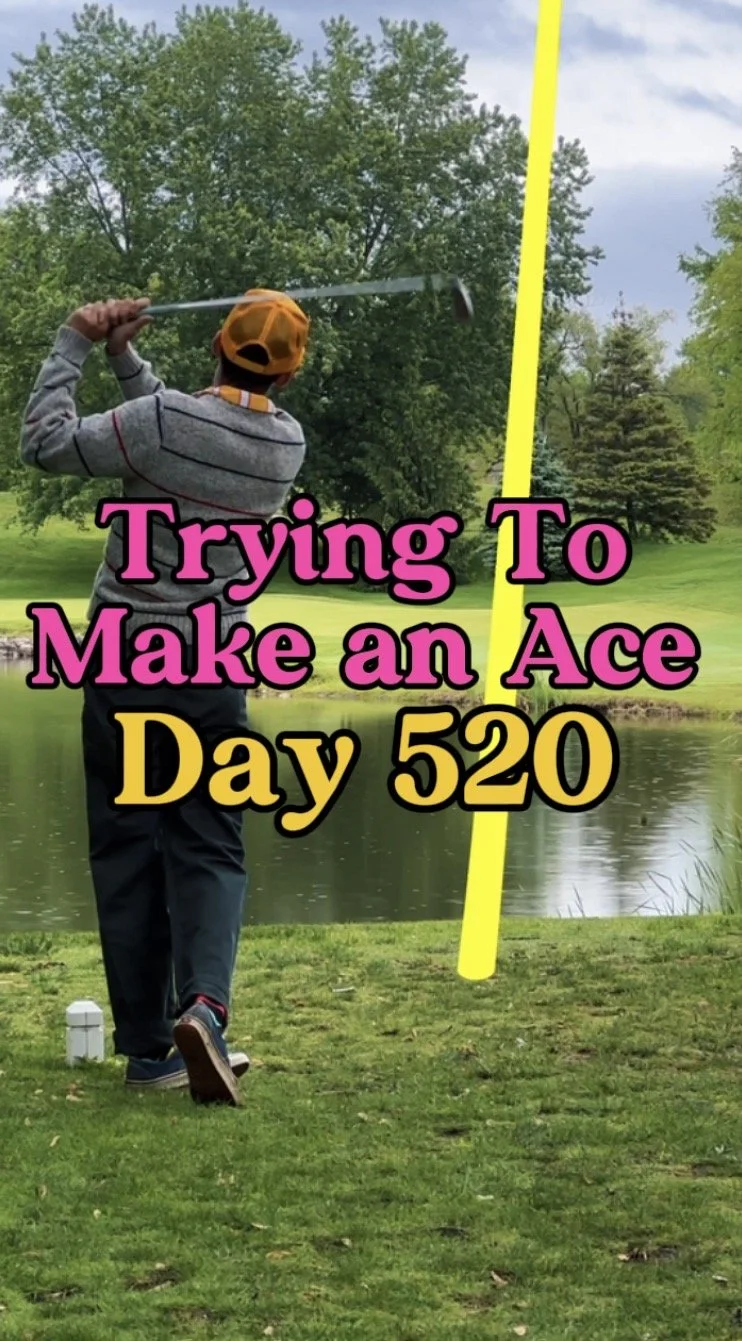 A person playing golf on a course near a pond, with a yellow pole and pink and yellow text overlaid that says, "Trying To Make an Ace Day 520."