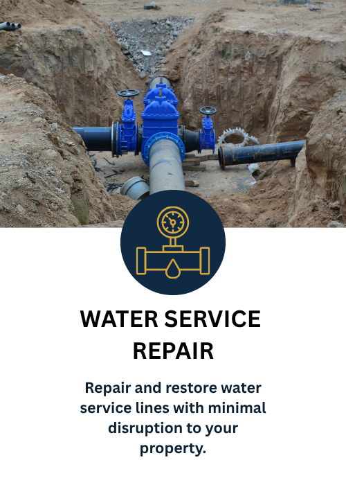 A large water pipe and valves being repaired underground at a construction site with dirt around