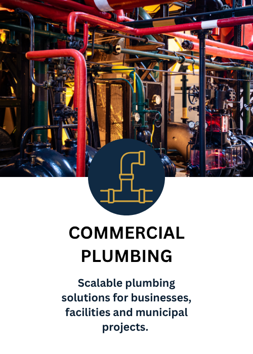Industrial pipes and machinery in a commercial plumbing setup.