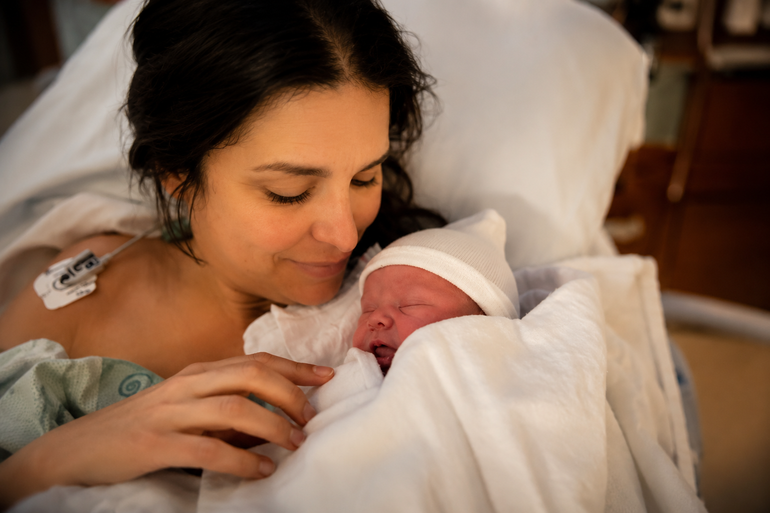 Mother and son who has Down Syndrome moments after birth and official diagnosis.