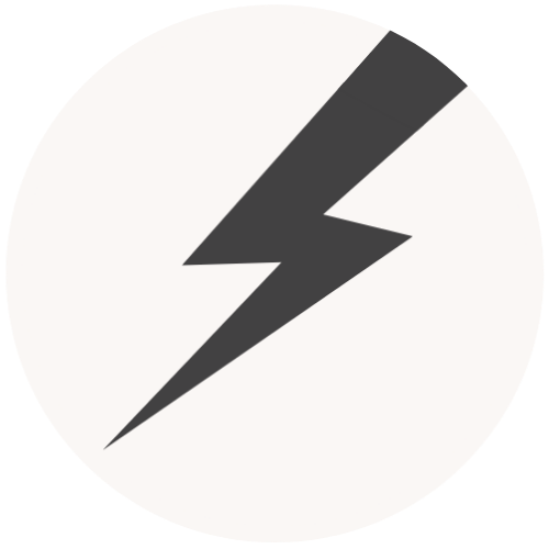 A white circle containing a charcoal lightning bolt icon.
