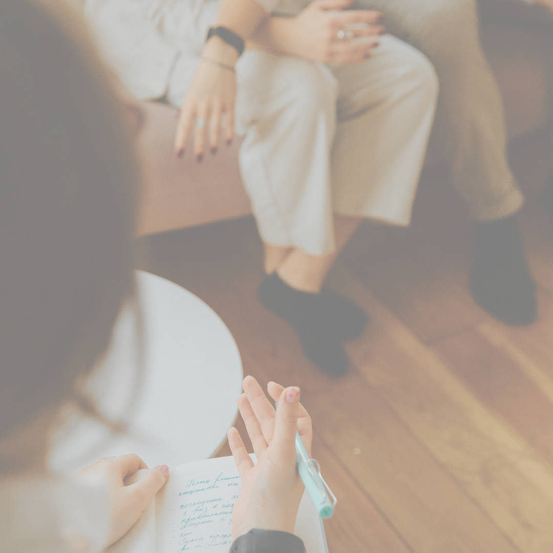 Close up of therapist holding notebook
