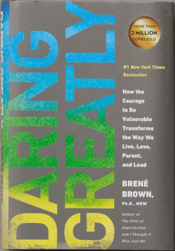 Book cover titled 'Daring Greatly' by Brené Brown, with a sticker indicating over 2 million copies sold, and text stating it's a number one New York Times bestseller about vulnerability, love, parenting, and leadership.