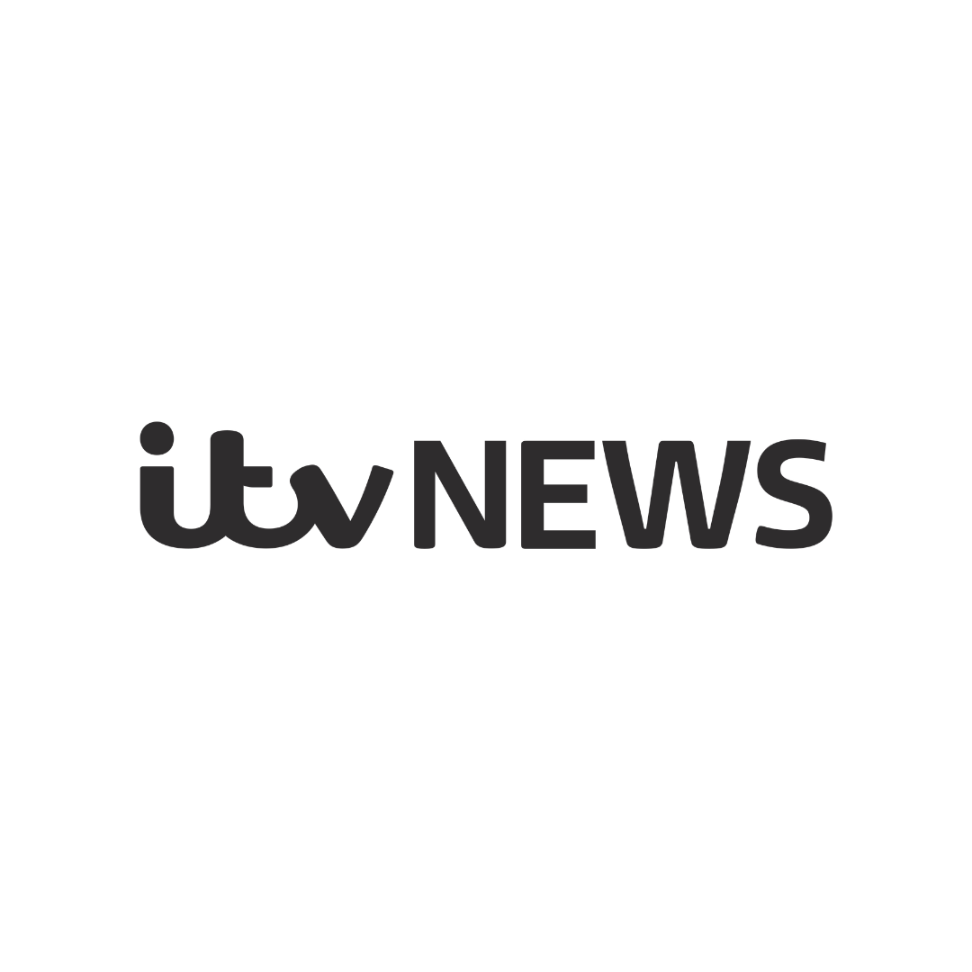 Black background with the ITV News logo in grayscale.
