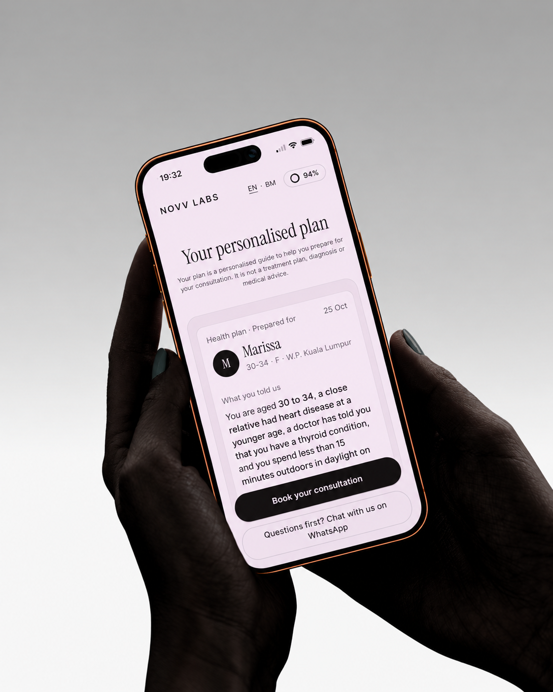 Hands holding a smartphone displaying a NOVV Labs personalized health plan and consultation booking screen.