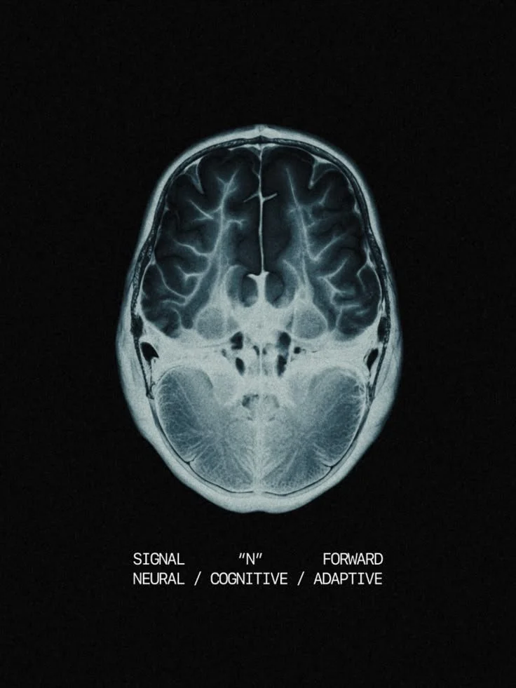 Axial brain MRI scan with the words “Signal Neural / N Cognitive / Forward Adaptive” on a black background.