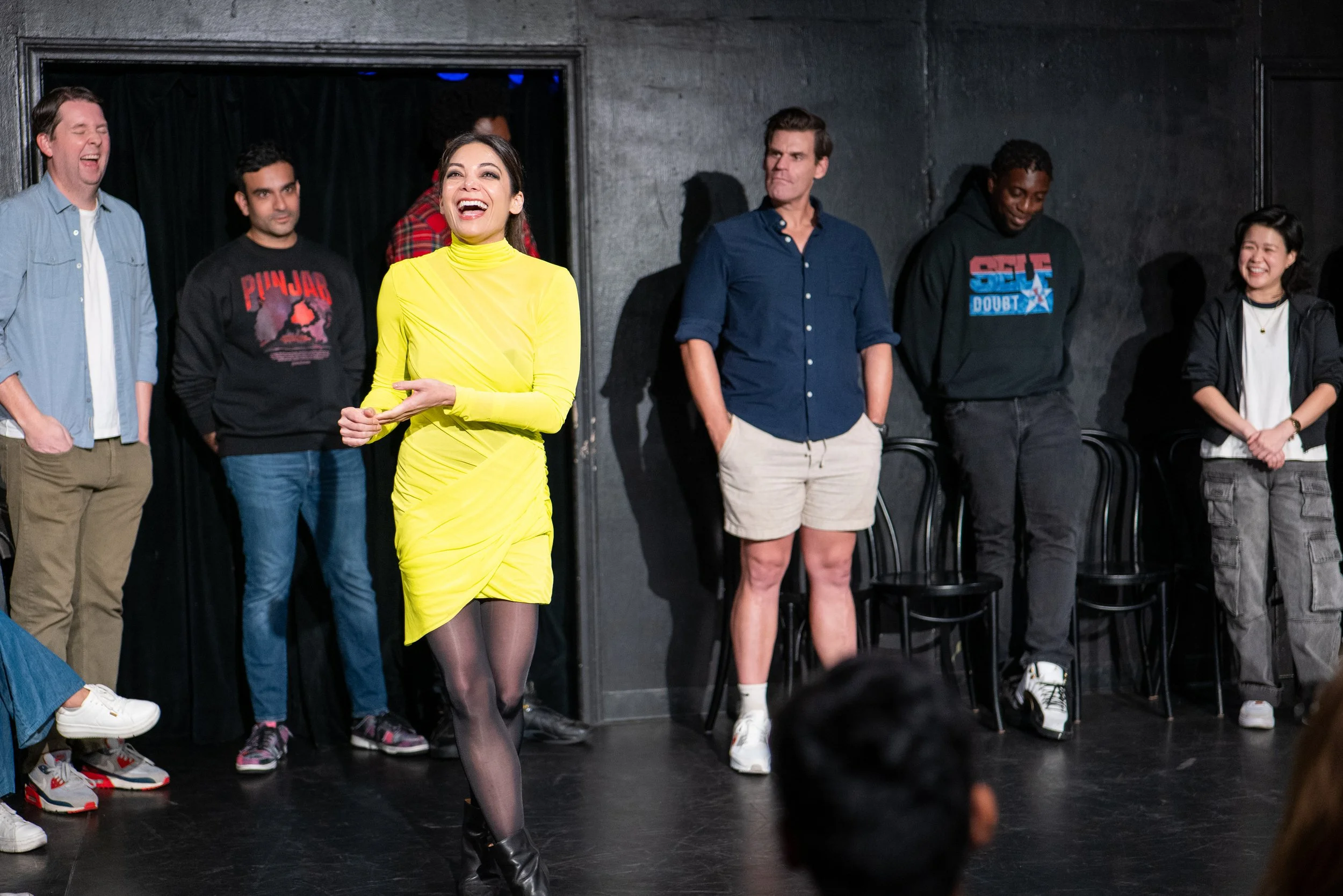 Ginger Gonzaga guest hosting ASSSSCAT on stage at The Upright Citizens Brigade in Hollywood, captured by a local comedy photographer.