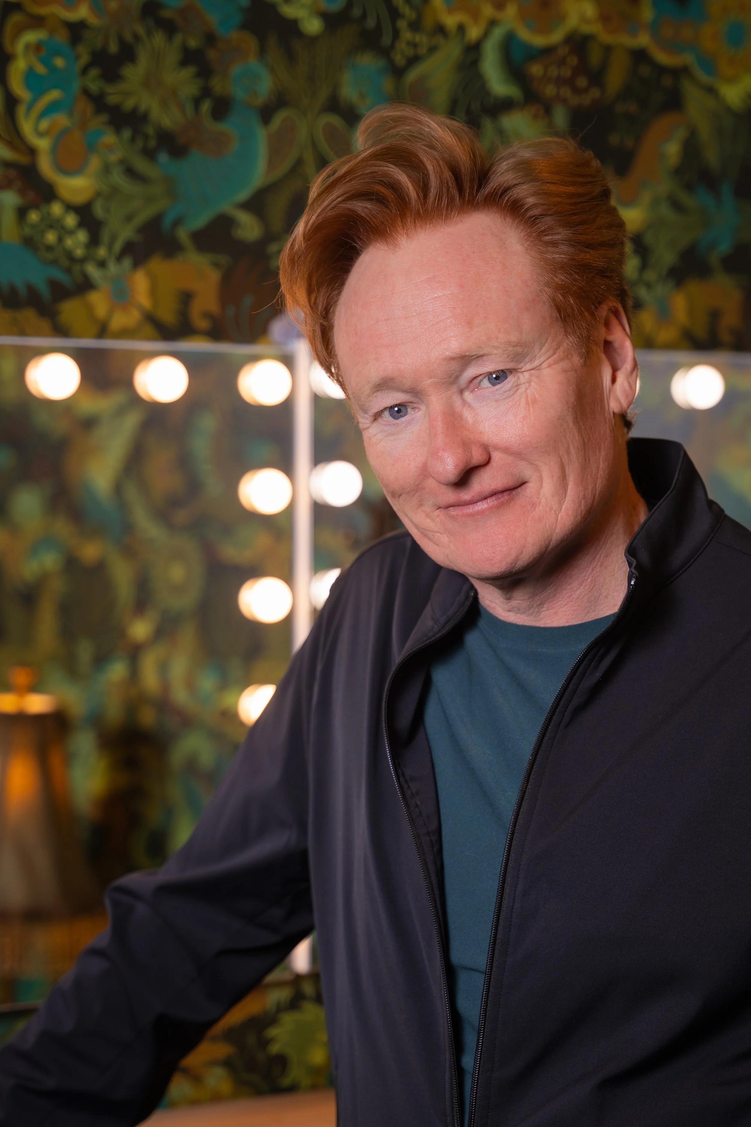 Candid green room portrait of Conan O'Brien backstage before a live show at UCB Franklin in Hollywood