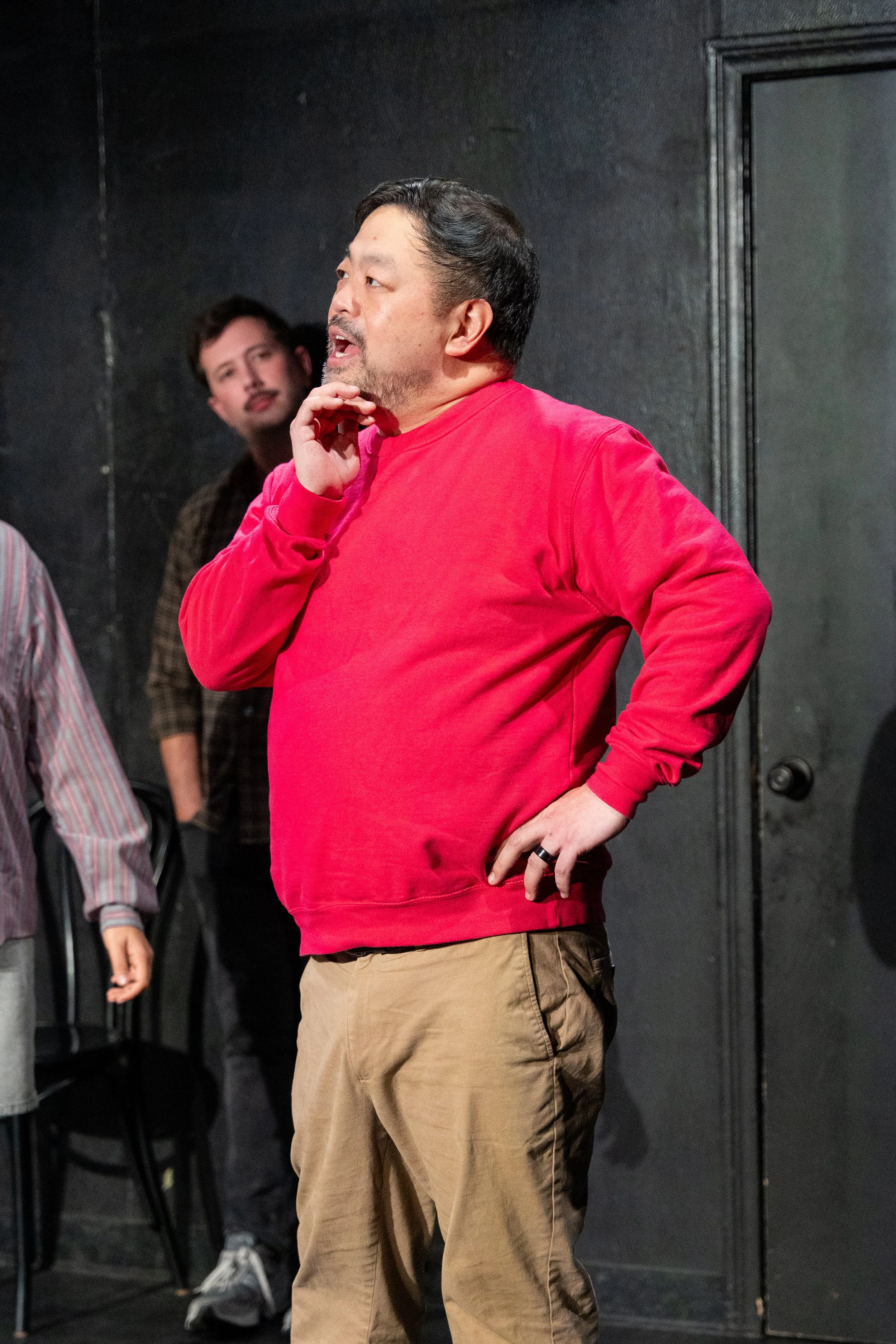 Chris Grace performing a live improv comedy set on stage at The Upright Citizens Brigade in Hollywood, captured by a local comedy photographer.