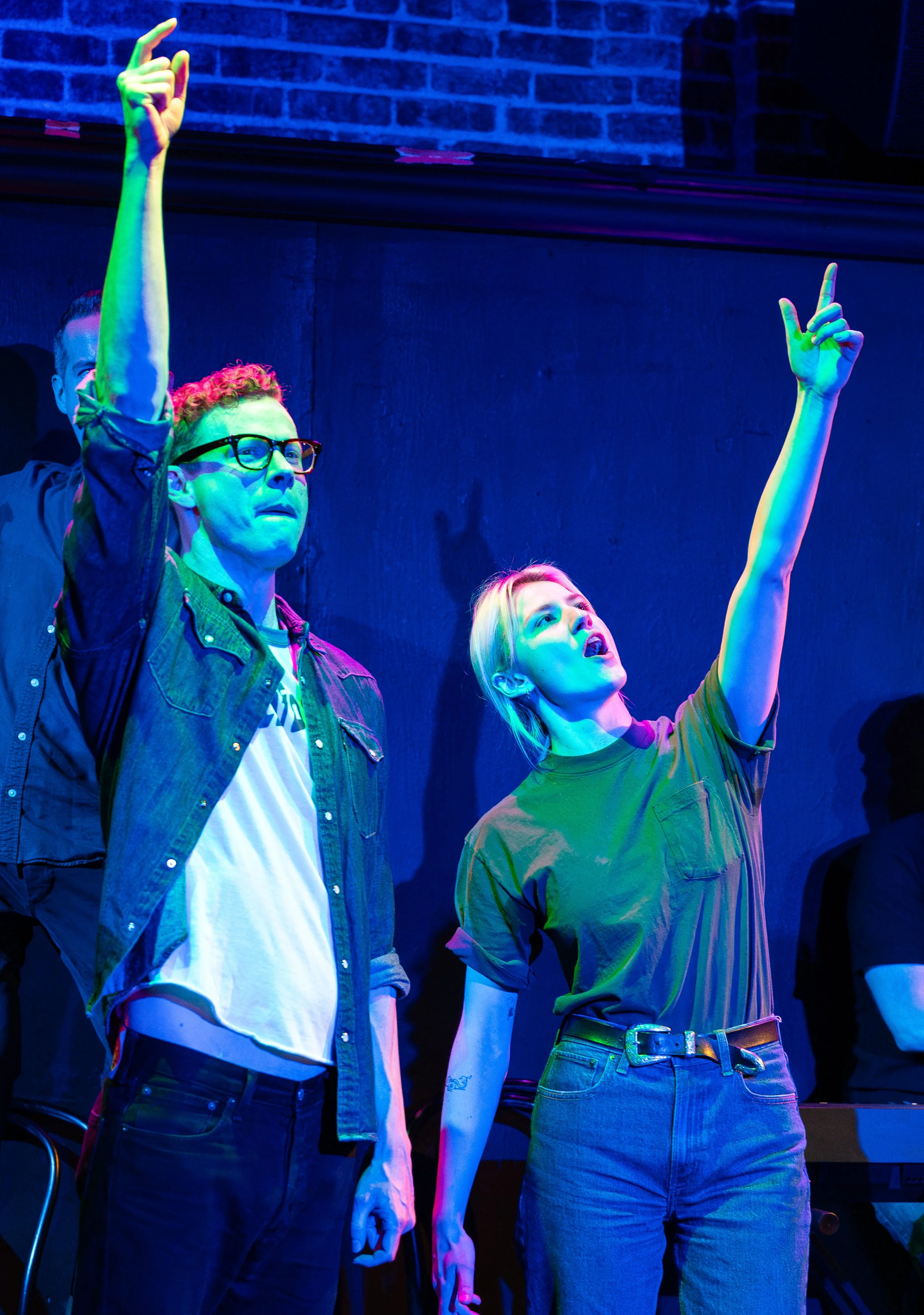 Ross Bryant and Madison Dahm performing a live musical improv comedy set on stage at The Upright Citizens Brigade in Hollywood, captured by a local comedy photographer.