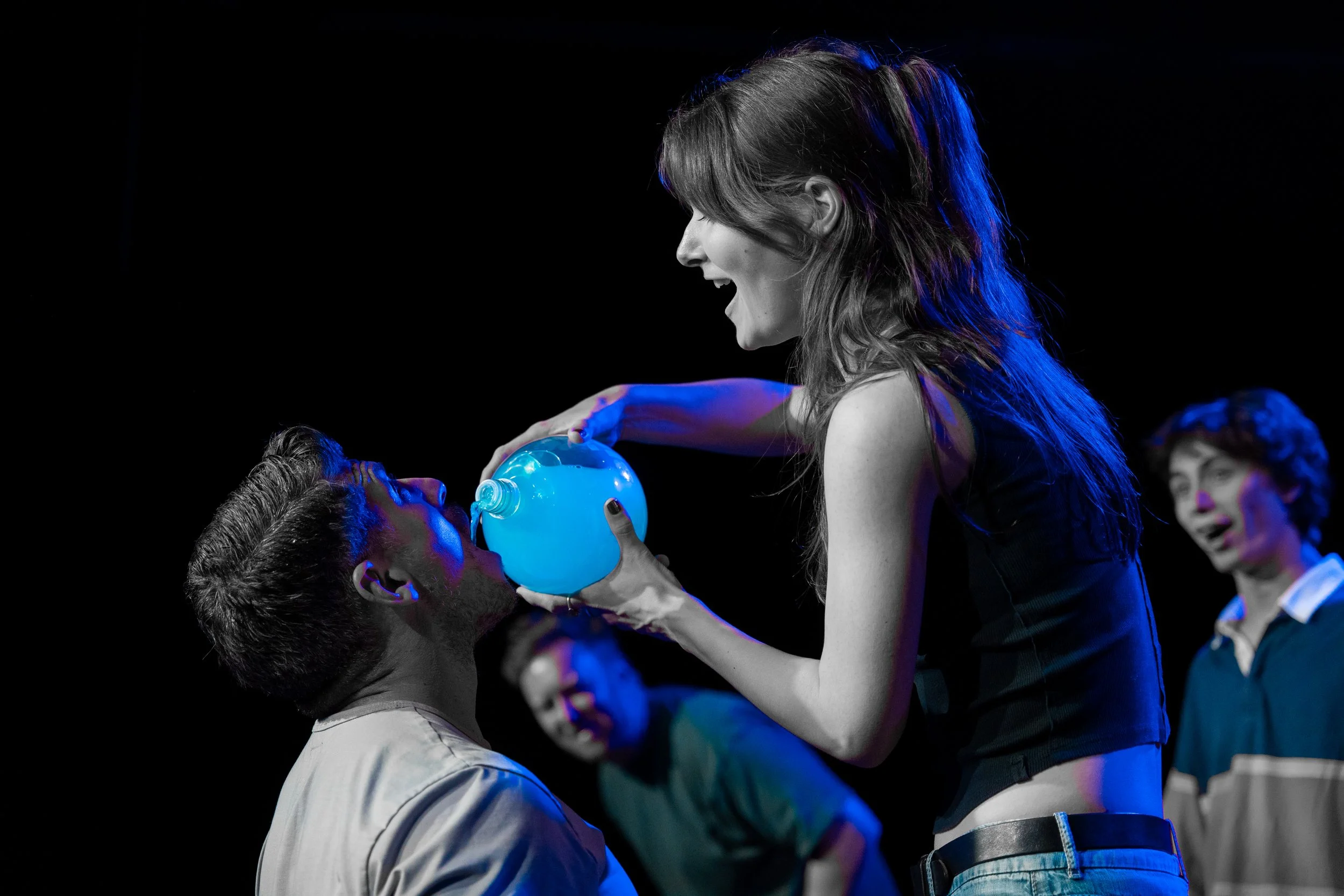Ava Bunn performing a live improv comedy set on stage at The Upright Citizens Brigade in Hollywood, captured by a local comedy photographer.
