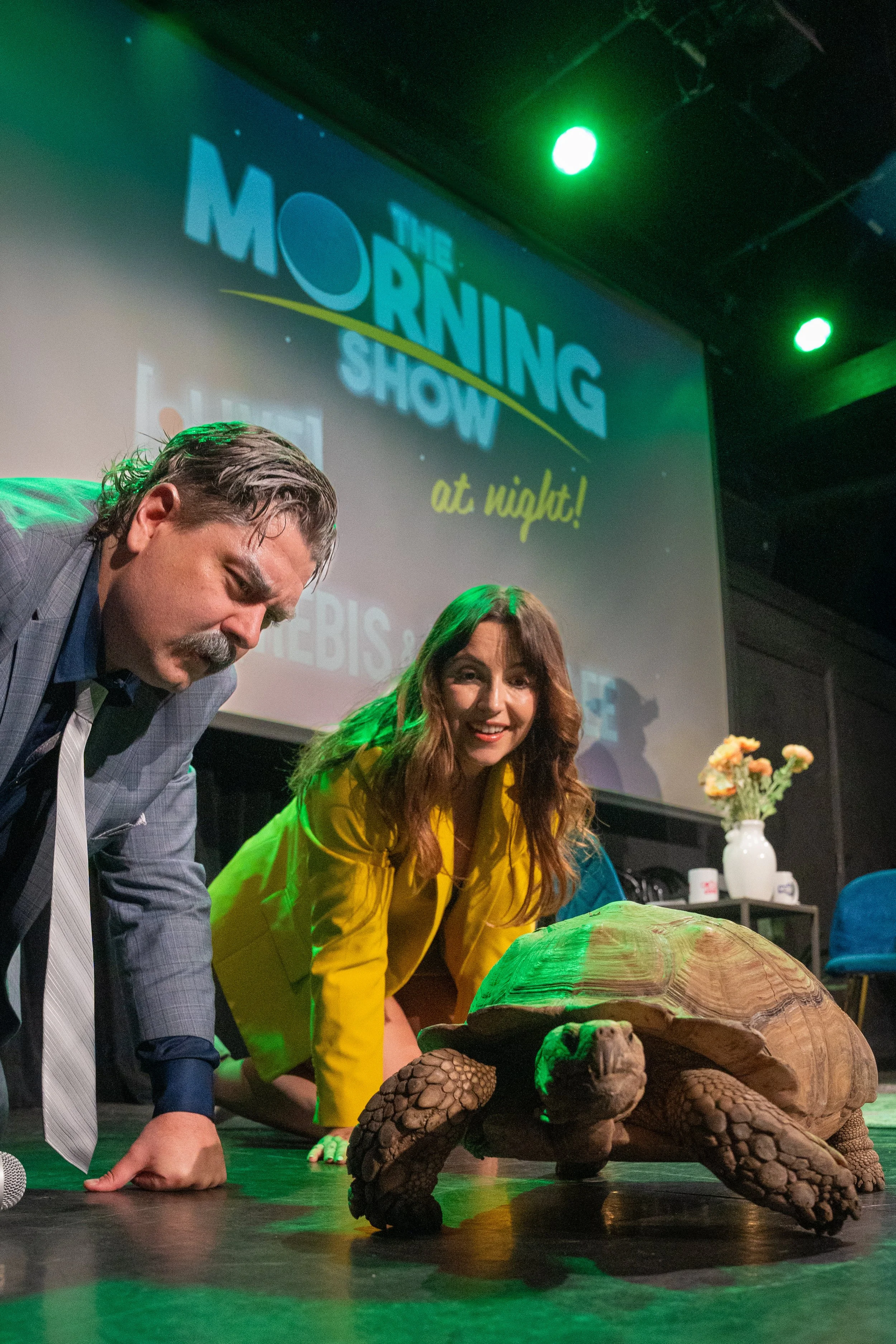 Justin Page and Katie Roletto performing a live comedy set on stage at The Upright Citizens Brigade in Hollywood, captured by a local comedy photographer.