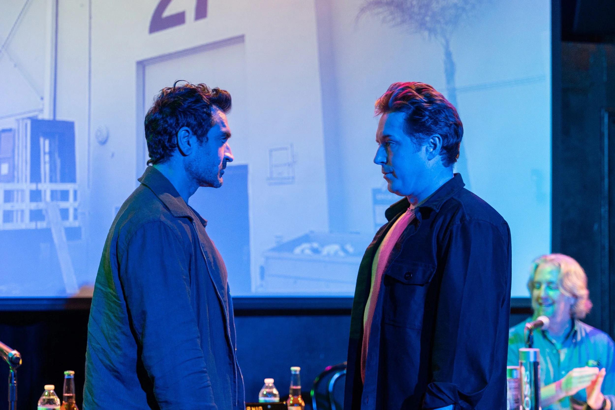 Kumail Nanjiani and Beck Bennett performing a live comedy set on stage at The Upright Citizens Brigade in Hollywood, captured by a local comedy photographer.