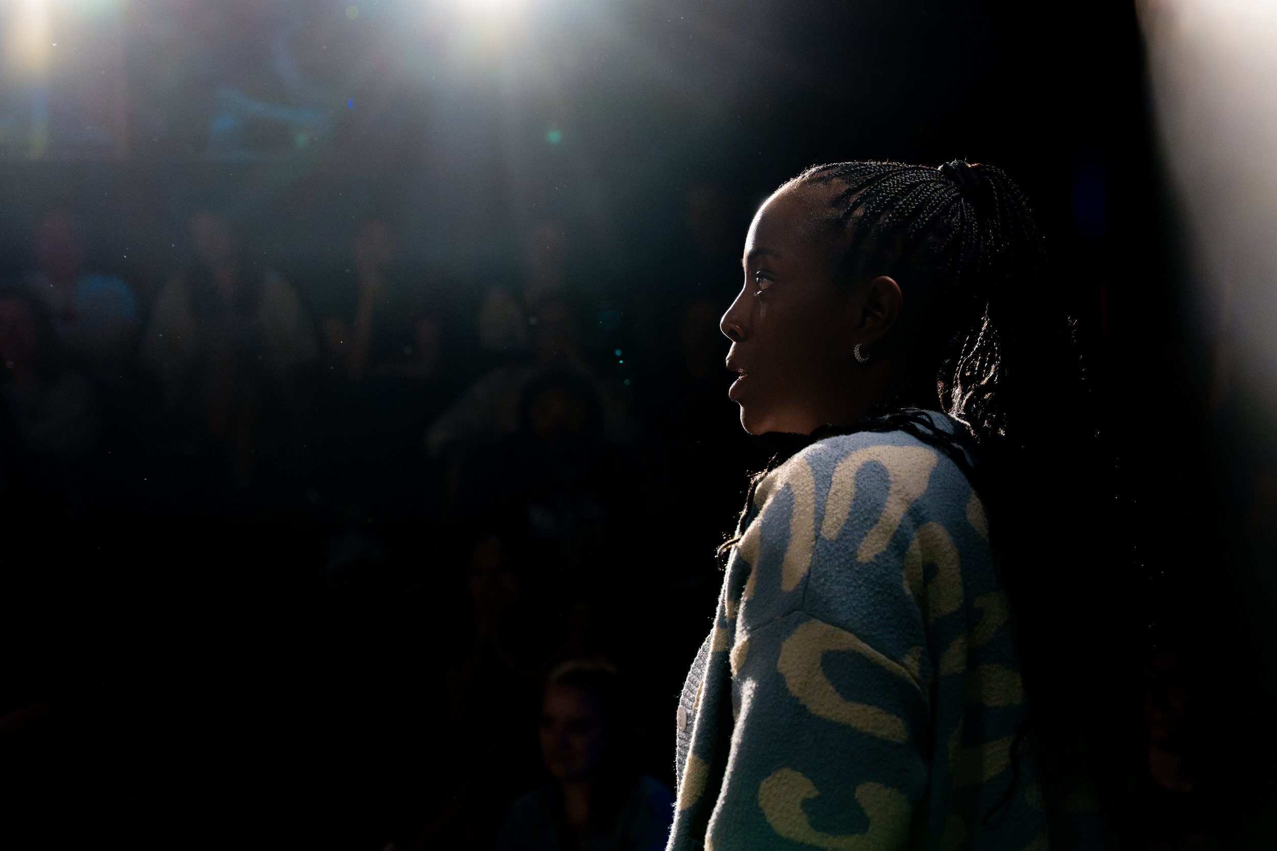 Toni Adeyemi performing a live improv comedy set on stage at The Upright Citizens Brigade in Hollywood, captured by a local comedy photographer.