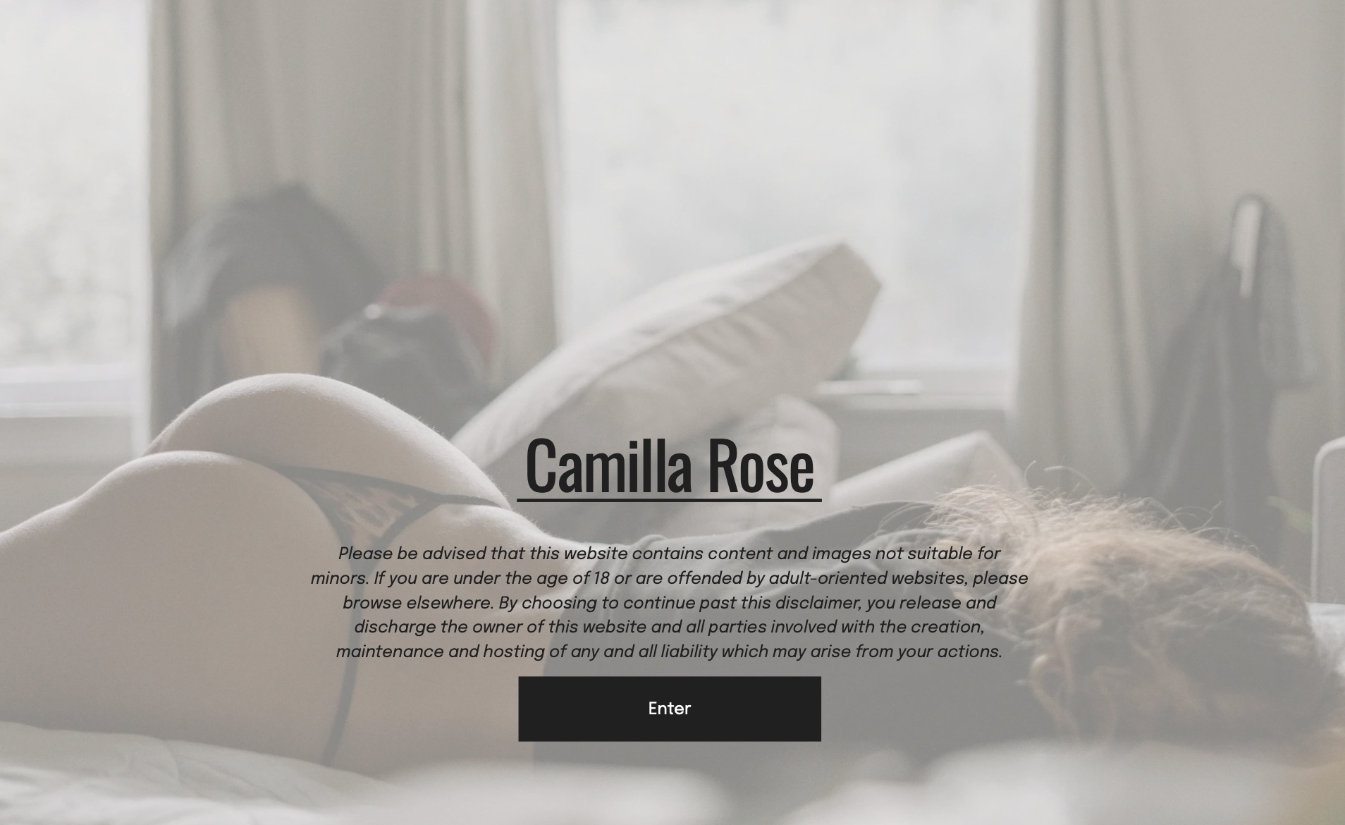 A blurred photo of a bedroom with a bed and pillows. Over the image, there's a text overlay saying "Camilla Rose" with an underline. Below, it states, "Please be advised that this website contains content and images not suitable for minors. If you are under the age of 18 or are offended by adult-oriented websites, please browse elsewhere. By choosing to continue past this disclaimer, you release and discharge the owner of this website and all parties involved with the creation, maintenance and hosting of any and all liability which may arise from your actions." There is an "Enter" button below the text.