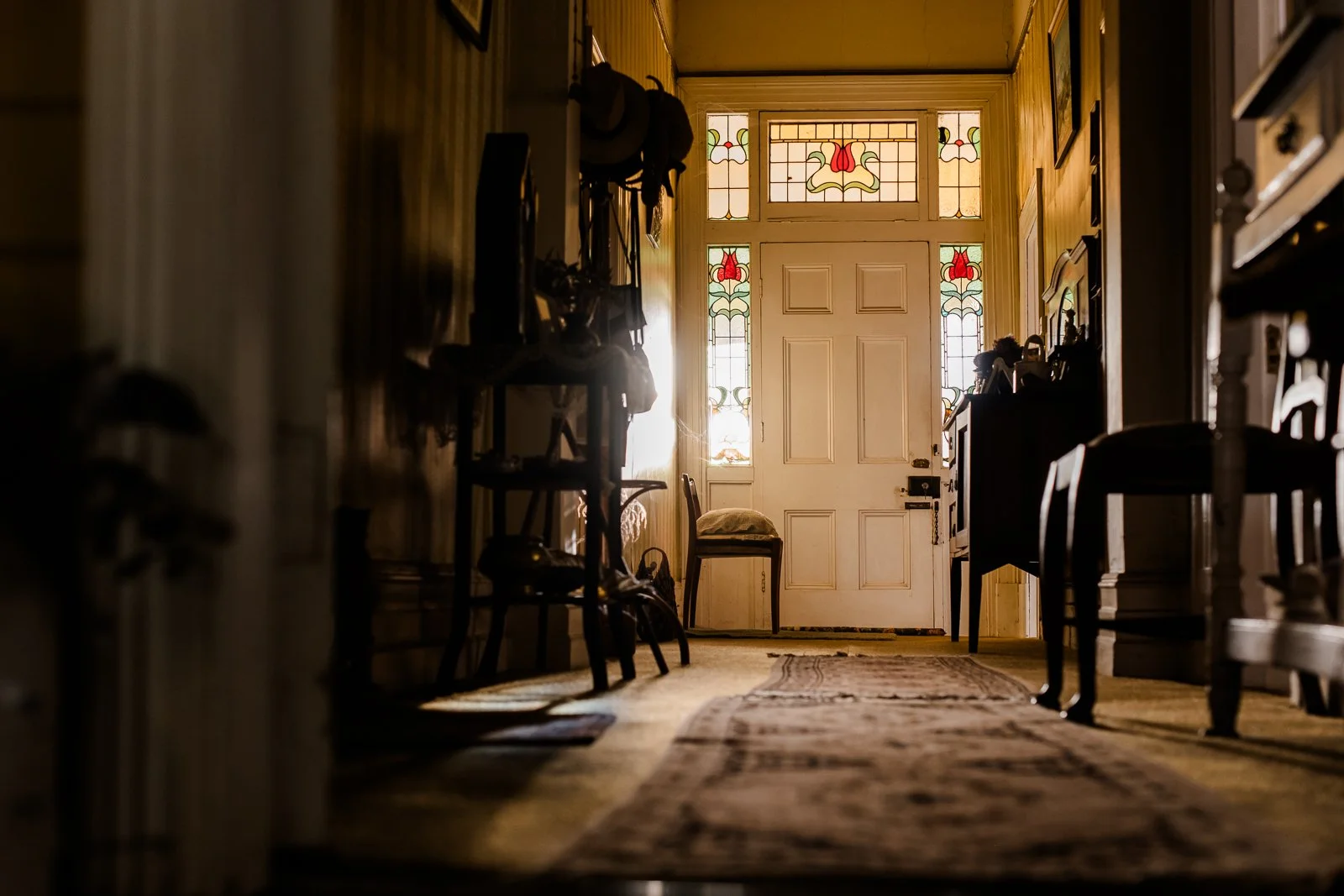 Hallway and stained-glass front door