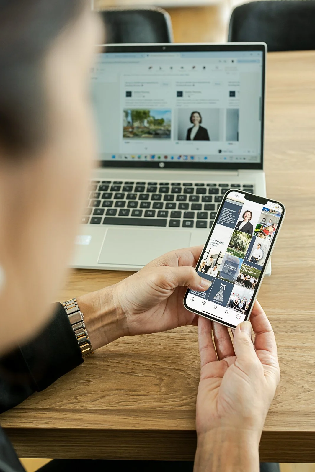 Marketing team member using professional brand photography across Instagram and digital marketing.