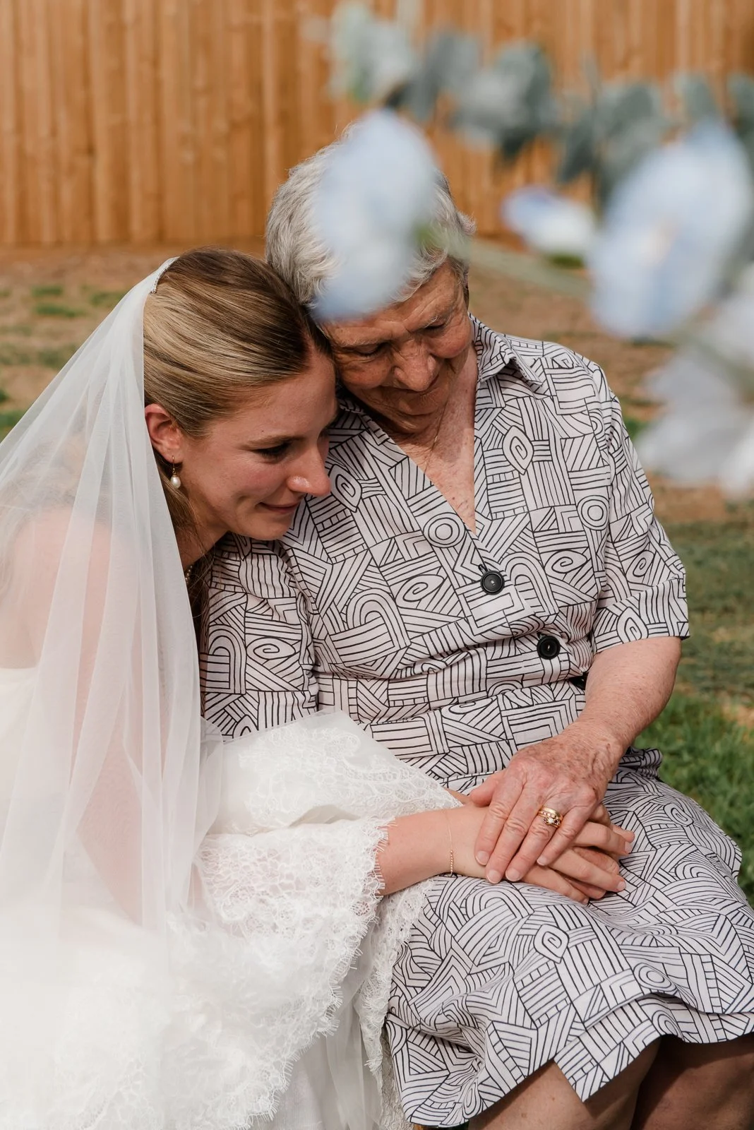 Bride sharing a quiet moment with her grandmother during a relaxed regional wedding in Victoria.