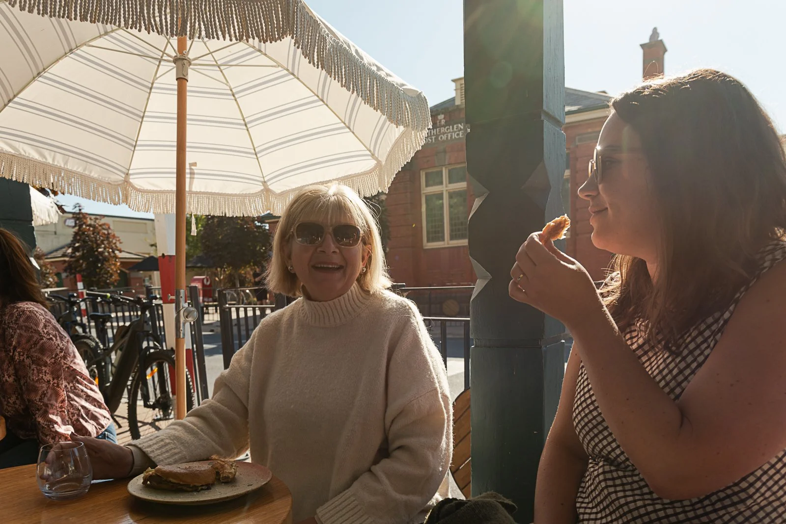 Guests enjoying food and wine outside Grace Bar + Eatery in Rutherglen.